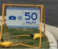 Speed camera warning sign